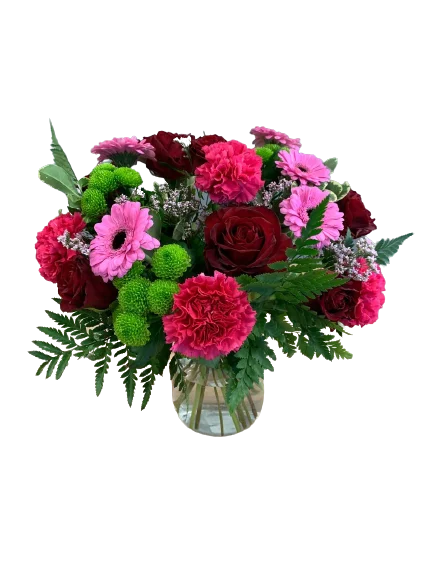 Bukiet róż z intensywnie czerwonymi różami i różowymi kwiatami w żywej kompozycji