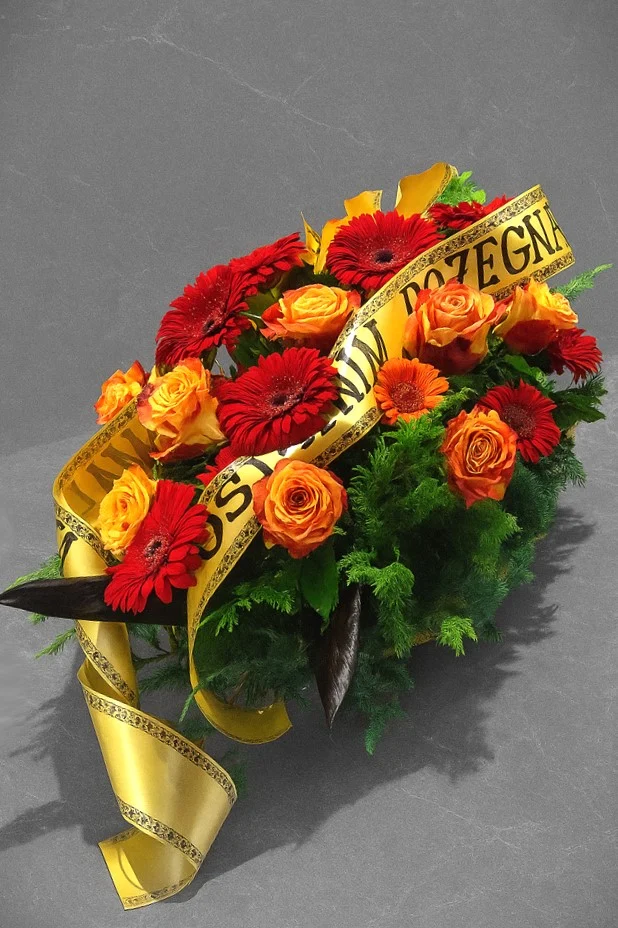 Klasyczna wiązanka pogrzebowa na trumnę z gerber i pomarańczowych róż